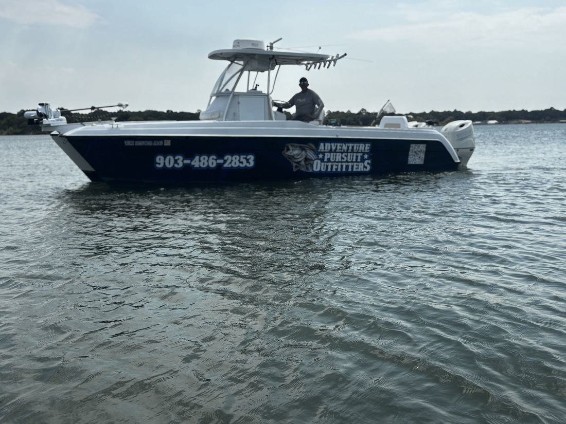 The Adventure Pursuit Outfitters guide boat on Lake Texoma